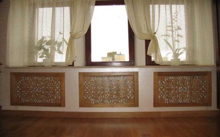 Декоративные экраны на батарею отопления: обзор различных видов решеток + советы по выбору Декоративные экраны на батарею отопления: обзор различных видов решеток + советы по выбору