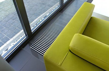 Водяные внутрипольные конвекторы отопления: виды, особенности монтажа и обустройства Водяные внутрипольные конвекторы отопления: виды, особенности монтажа и обустройства