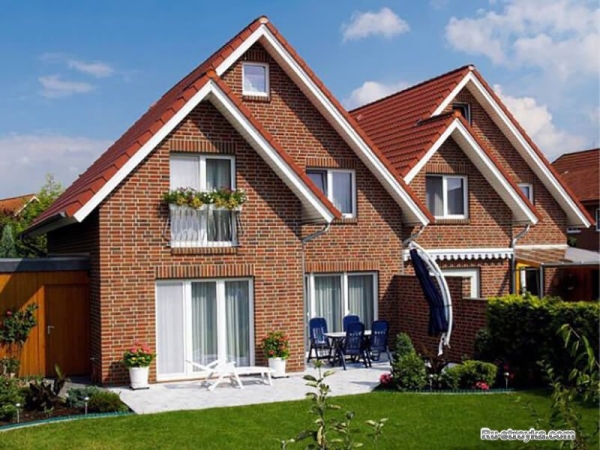 Отделка фасада цементно-стружечными плитами Отделка фасада цементно-стружечными плитами