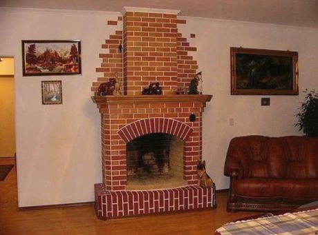 Отделка камина искусственным камнем Отделка камина искусственным камнем