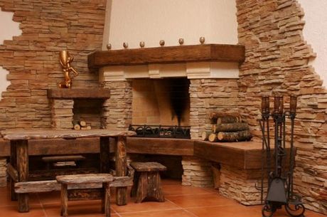 Отделка камина искусственным камнем Отделка камина искусственным камнем