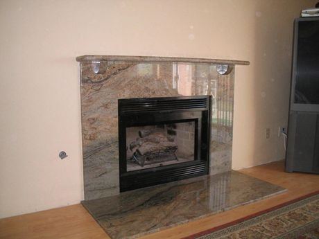 Отделка камина искусственным камнем Отделка камина искусственным камнем