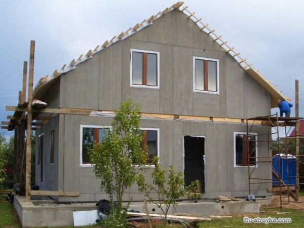 Отделка фасада цементно-стружечными плитами Отделка фасада цементно-стружечными плитами